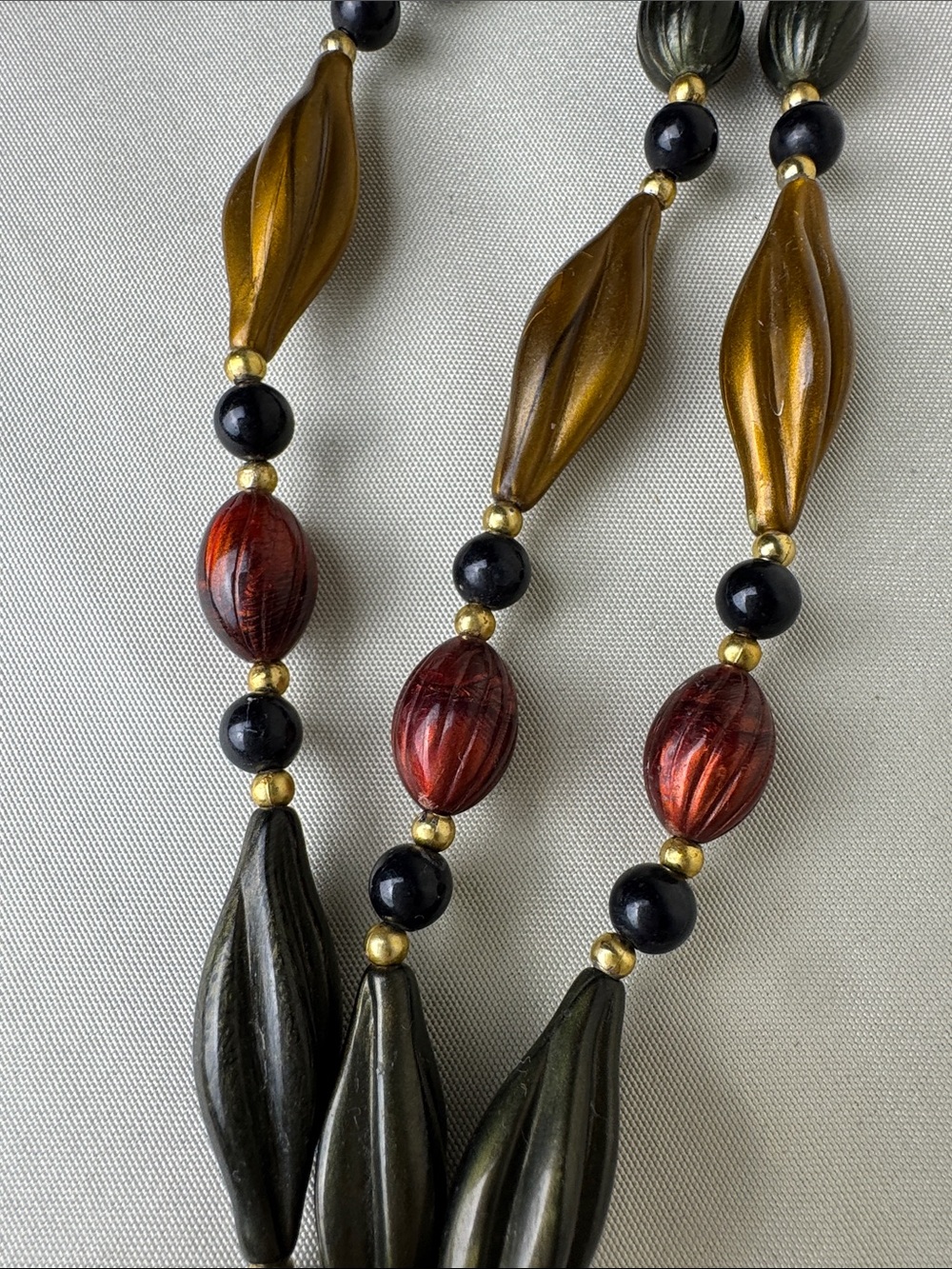 Multi-Strand Metallic Bead Necklace in Red, Gold & Black - Picture 9 of 10